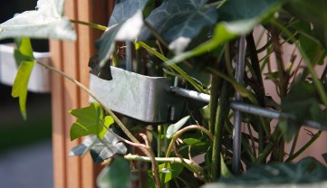 Stap 8: Hang de haag in de bovenste beugel